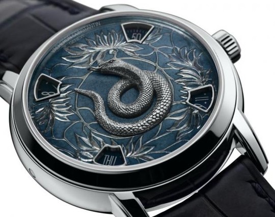 Đồng hồ đeo tay dây da khắc hoạ hình rắn